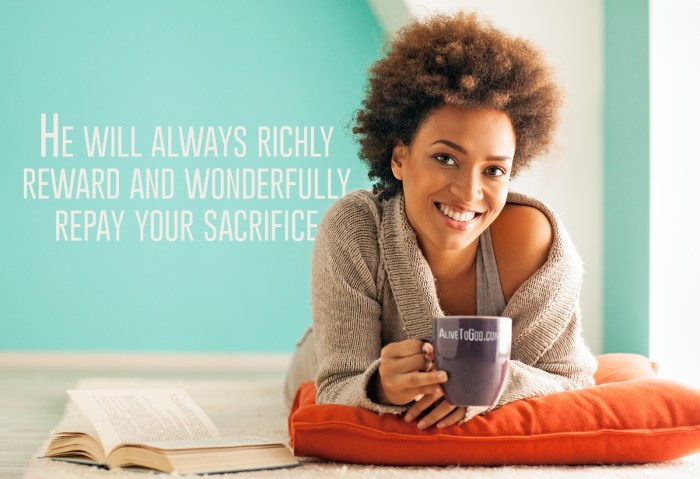Beautiful young African woman enjoying a cup of coffee while relaxing at home.
